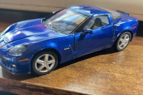 Kinsmart 2007 Chevrolet Corvette diecast toy car, blue, 1:36 scale