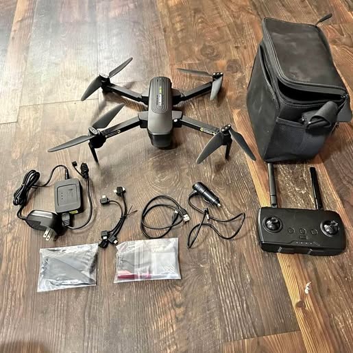 Hubsan Zino Pro drone kit with quadcopter, remote controller, cables, charger, carrying bag