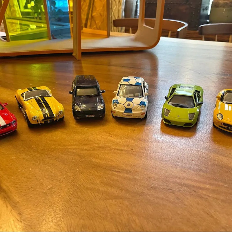 Set of six 1:32 scale diecast cars, assorted colors and designs