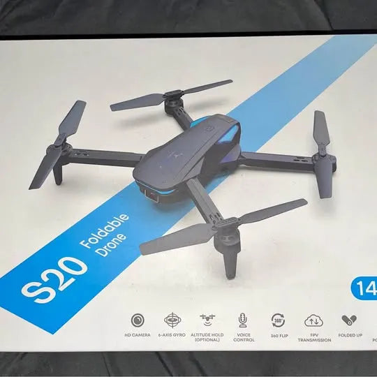 Foldable quadcopter drone with camera, four propellers and foldable arms