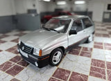1/24 scale diecast car model, silver with black front bumper and grille