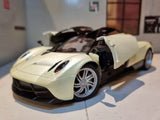 White 1:24 scale diecast supercar model with silver wheels, front 3/4 view