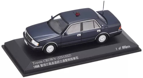 Tomica Toyota Crown 4-door diecast sedan model, dark blue, detailed interior
