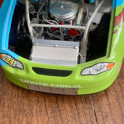 1:24 diecast race car front, green nose with grille and headlights