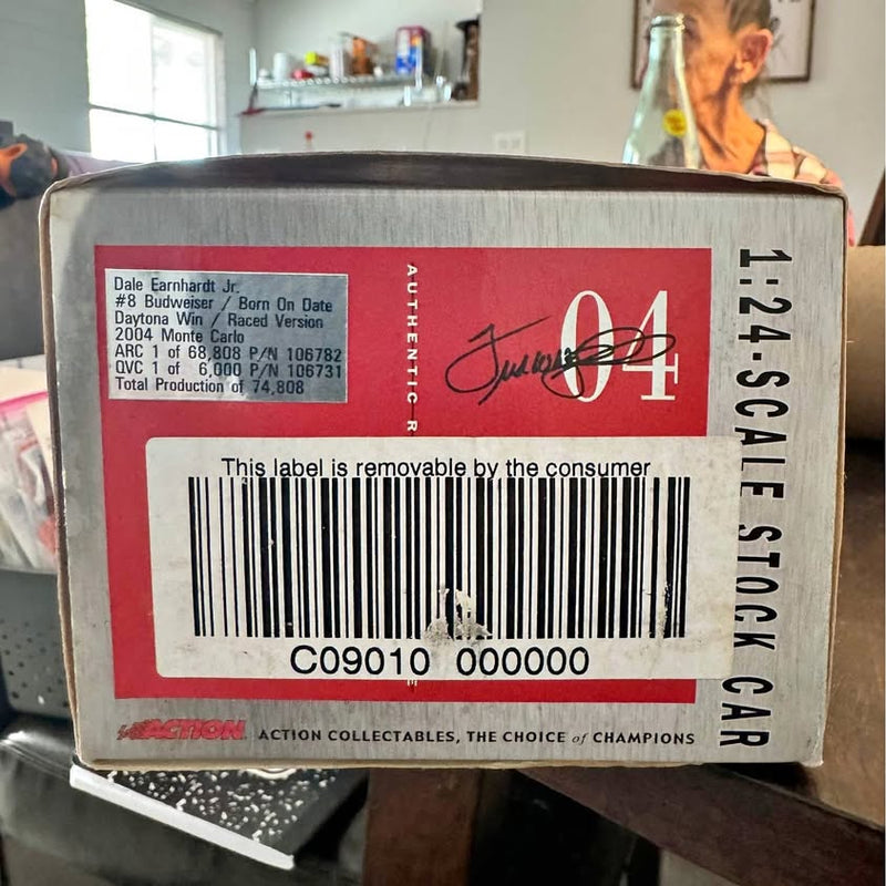 Racing diecast car box with Dale Jr and Kyle Busch branding, barcode and production info