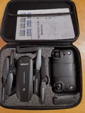Foldable drone with HD camera and remote controller in hard case