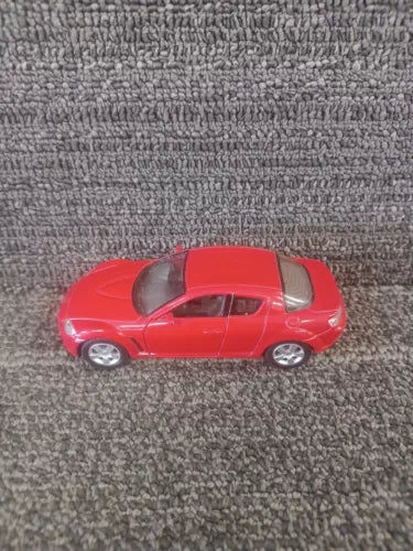 1:36 Mazda RX-8 diecast car by Kinsmart, red with silver details
