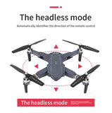 Gray quadcopter RC drone with four propellers and central camera module