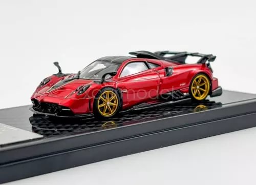 Red 1:64 scale diecast sports racing car with gold wheels and rear spoiler