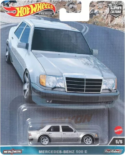 Diecast Mercedes-Benz 500 E toy car, silver with blue racing graphics, in blister pack