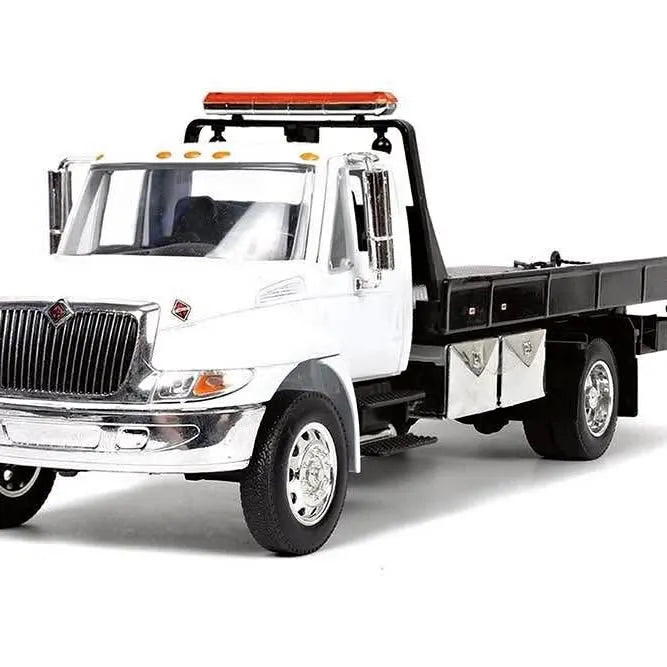1:24 diecast flatbed tow truck, white cab with black bed and chrome grille