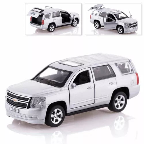 White Chevrolet Tahoe diecast SUV model with chrome wheels and black window trim