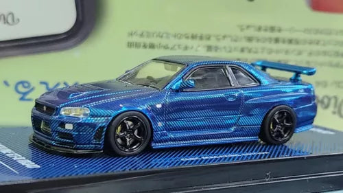 Blue carbon-fiber diecast model car with black wheels and detailed body kit