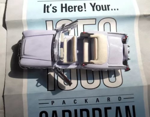 1953 Packard Caribbean convertible diecast car, open-top model in box