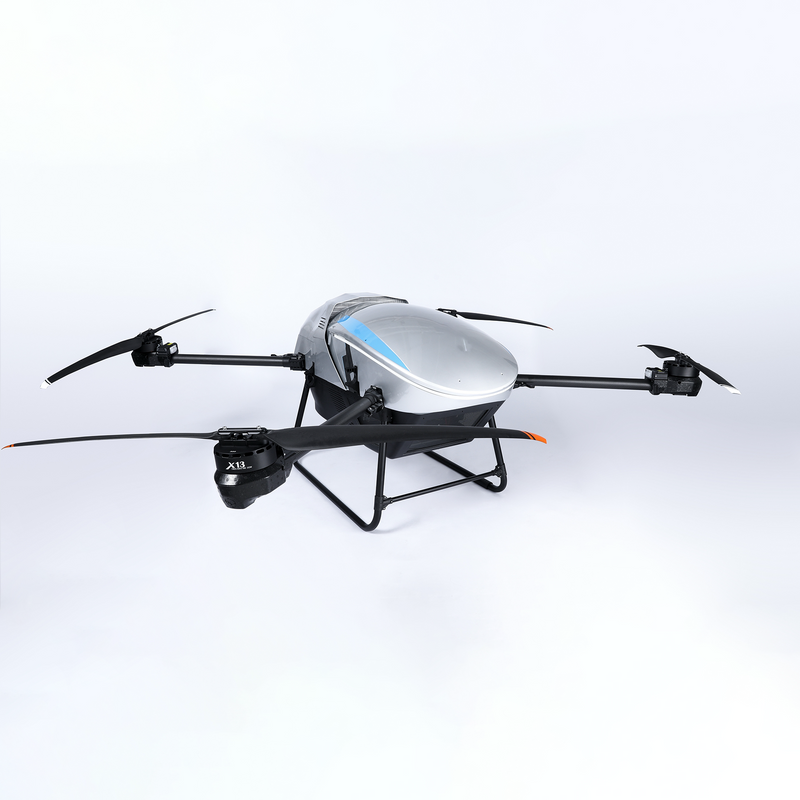Agricultural cargo delivery drone with gray body, four rotors, and front pod