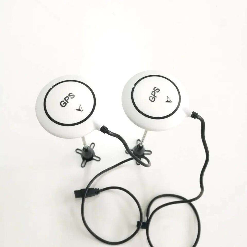 Dual GPS module with two circular GPS antennas and connecting cables