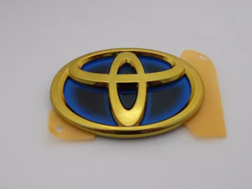 Toyota emblem detail with blue and gold finish