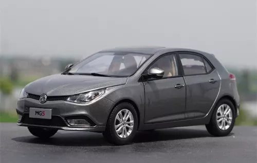 Grey MG5 die-cast car model, front 3/4 view