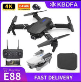 Compact quadcopter drone with camera, foldable arms, controller and carrying case