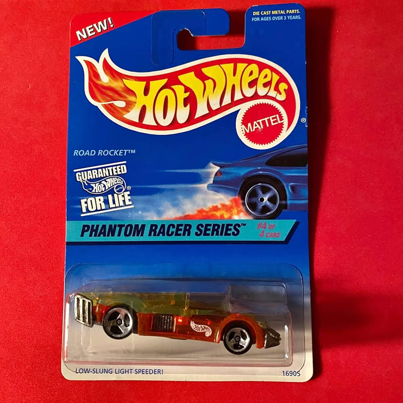 Hot Wheels diecast race car in blister pack, blue card, orange and dark wheels