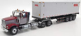 Diecast Western Star tandem day cab tractor with red-and-silver cab and gray trailer