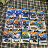 Hot Wheels diecast car set in blue blister packaging, multiple designs