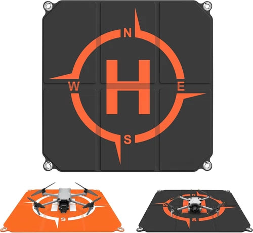 Foldable double-sided drone landing pad, orange and black with compass-style drone graphic