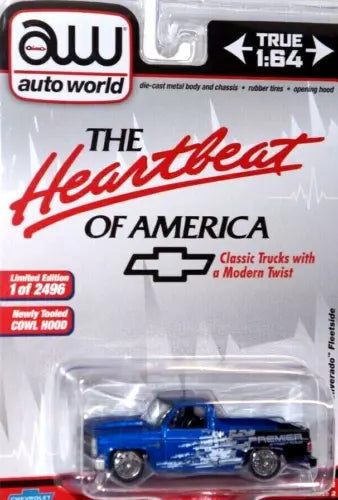 Blue 1:64 diecast Chevy Silverado pickup in clear blister packaging