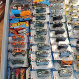 1/64 scale diecast cars blister pack assortment, including Hot Wheels vehicles
