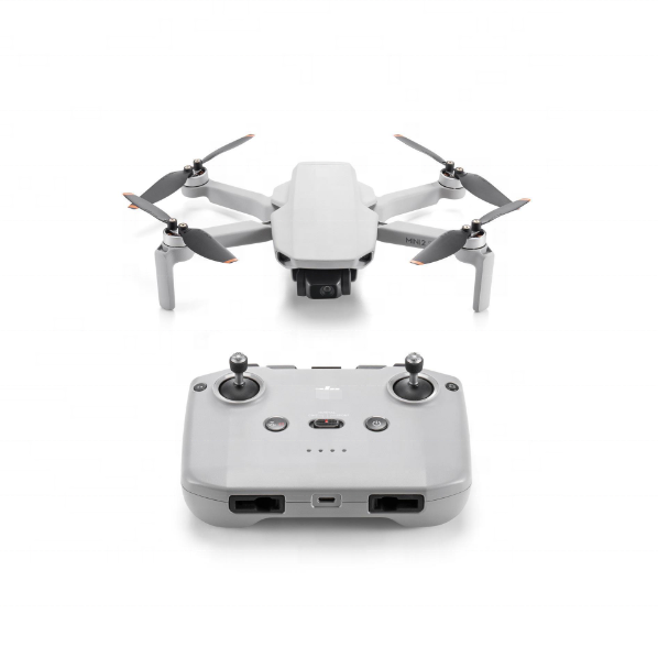 Foldable quadcopter drone with gray remote controller and four propellers