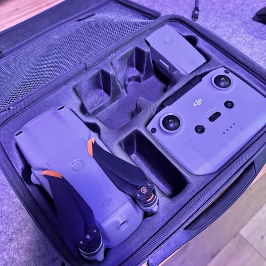 DJI Air 2S drone in protective foam case, top view with folded propellers