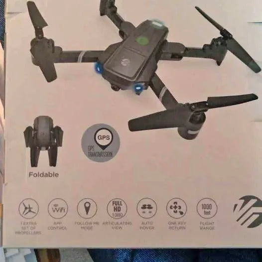 Foldable GPS drone with four propellers and front camera module