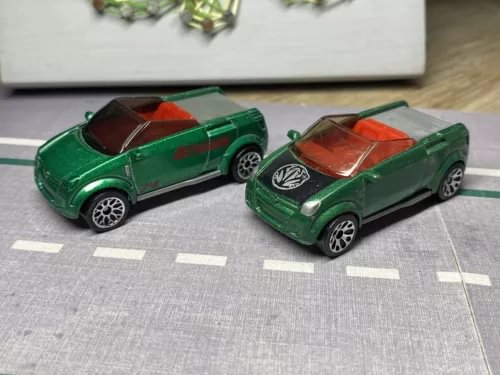Green diecast car set, two coupes with red interiors and black wheels
