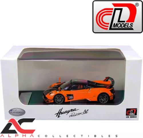 Orange 1:64 die-cast sports car model with rear wing, inside display box
