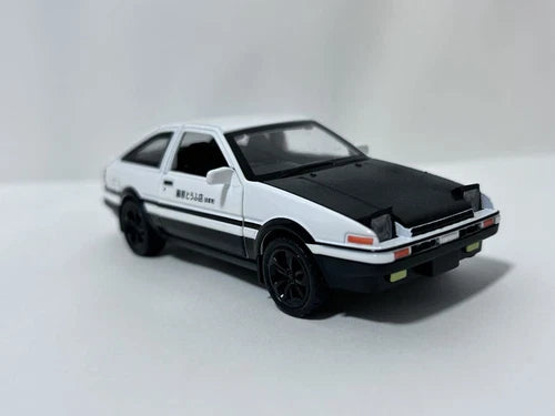 White and black 1/36 Toyota AE86 model car diecast, front 3/4 view