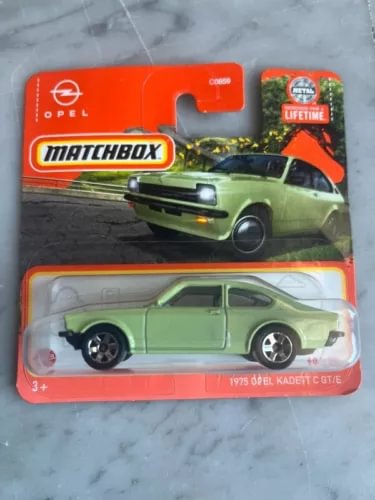 Green 1:64 diecast Opel Kadett C GT toy car in blister pack, Matchbox style