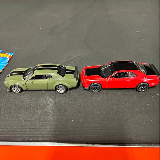 SRT Challenger diecast cars, red and light green, side by side