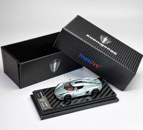 Ice blue sports racing diecast model car with display box and booklet
