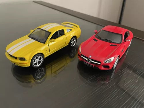 Set of 2 diecast pullback sports cars, yellow and red, front views
