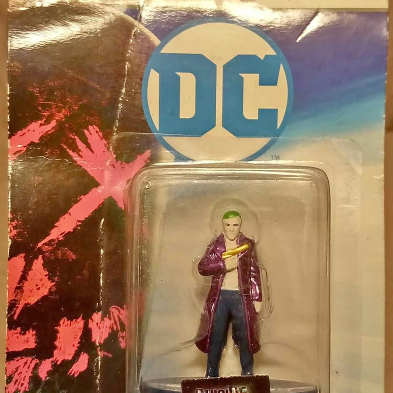 Joker diecast figure in blister pack, standing with purple coat and green hair