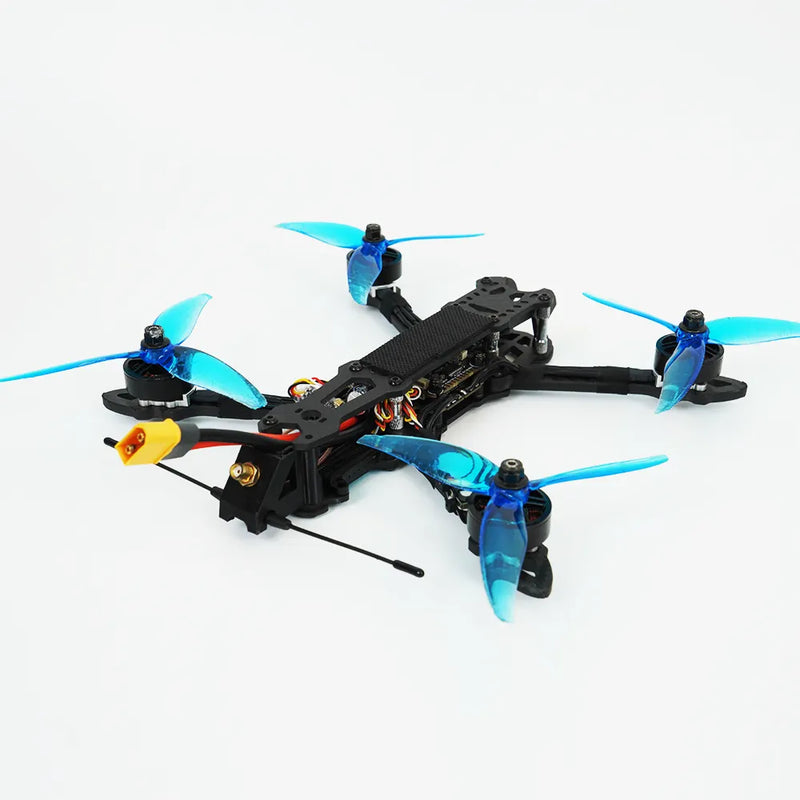 Black FPV quadcopter drone with four blue propellers and small camera frame