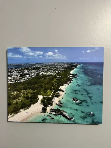 Canvas wall art with aerial view of turquoise ocean, sandy beach, and coastal greenery