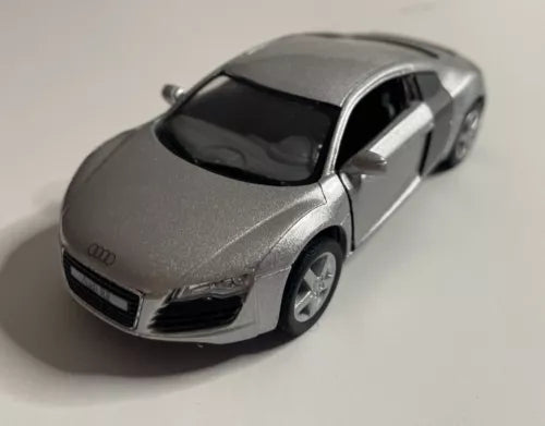 Silver Audi R8 coupe pull-back diecast car toy, front 3/4 view, black windows
