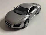 Silver Audi R8 coupe pull-back diecast car toy, front 3/4 view, black windows