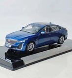 1/18 scale blue Cadillac CT5 diecast model car on black display base