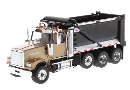 Diecast Masters Western Star dump truck, gold cab with black dump bed and silver wheels