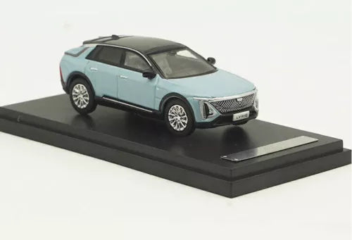 Cadillac LYRIQ 2022 diecast SUV model, teal, front three-quarter on display base