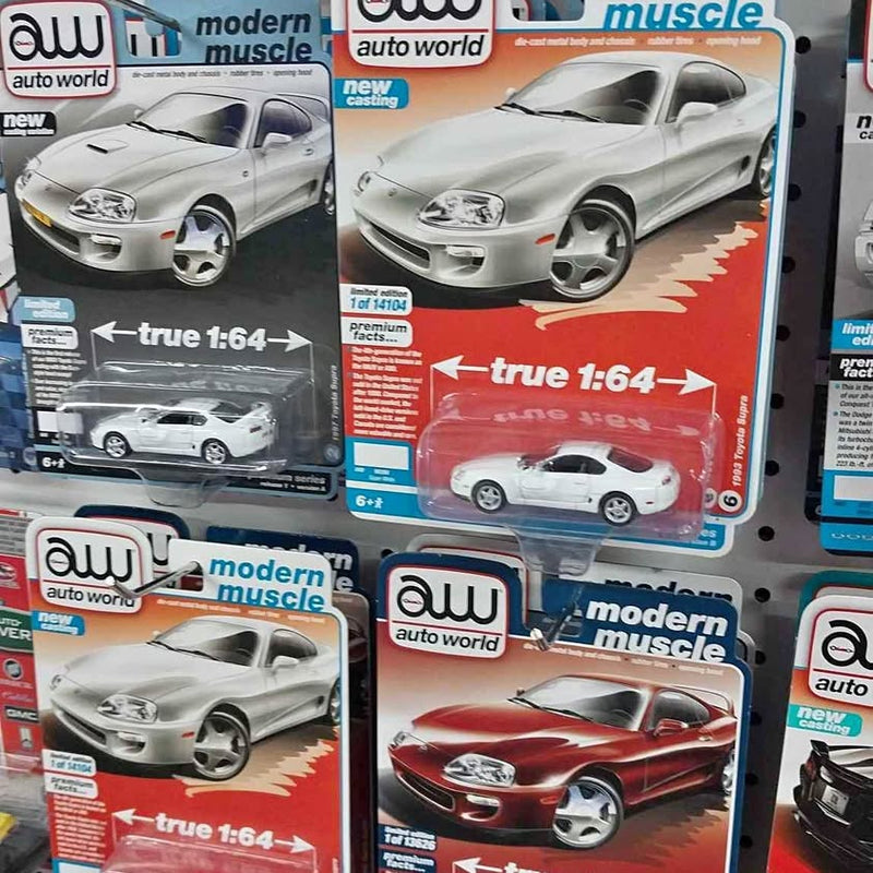 1:64 diecast car model in blister package, silver/white modern muscle coupe