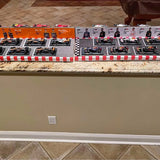 Diecast vehicle display set with multiple race cars in orange and white boxes