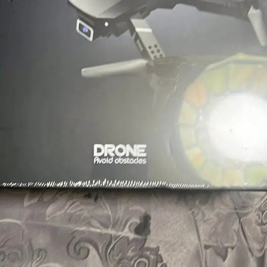 Black drone with DRONE logo and front controller panel